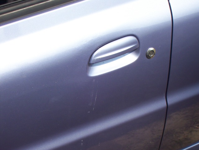 Paintless dent repair-Click on picture to return to Photo page
