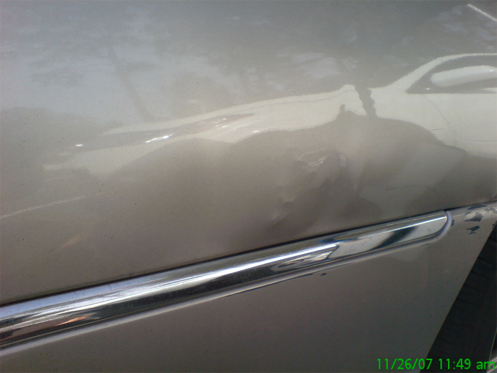 Lincolon Town Car ruined by other dent tech-Holy City Dent Guy-Paintless dent repair-